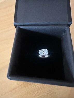 Pinky ring: classic solitaire oval CZ ring
